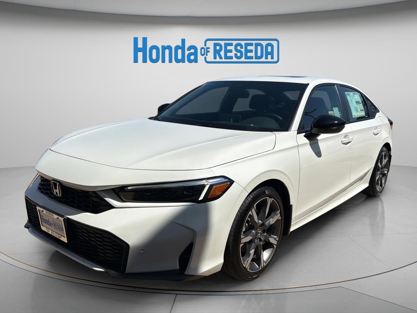 2026 Honda Civic Sport Touring Hybrid CVT's photo